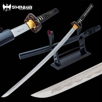 A sword that has been meticulously-hand forged using ancient, time-honored tempering techniques that give it a custom look A sword that has been meticulously-hand forged using ancient, time-honored tempering techniques that give it a custom look