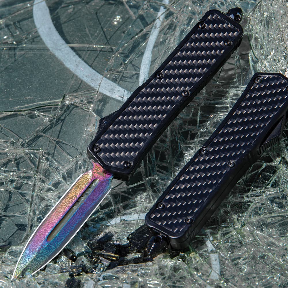 With our Carbon Fiber and Rainbow Anodized Automatic OTF Knife, you get smooth and lightning-fast action image number 0