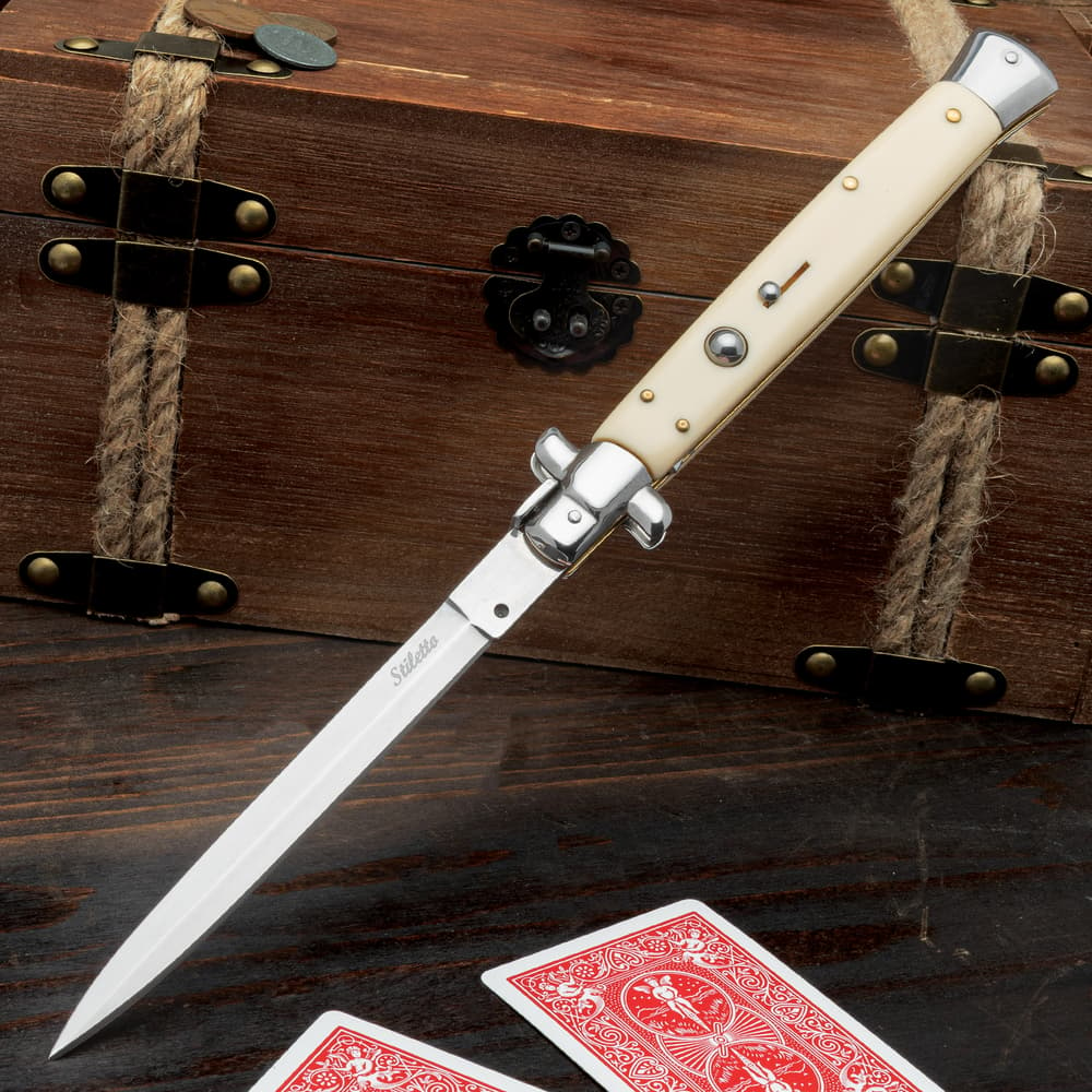 The Automatic Italian Ivory Stiletto Knife shown fully deployed image number 0
