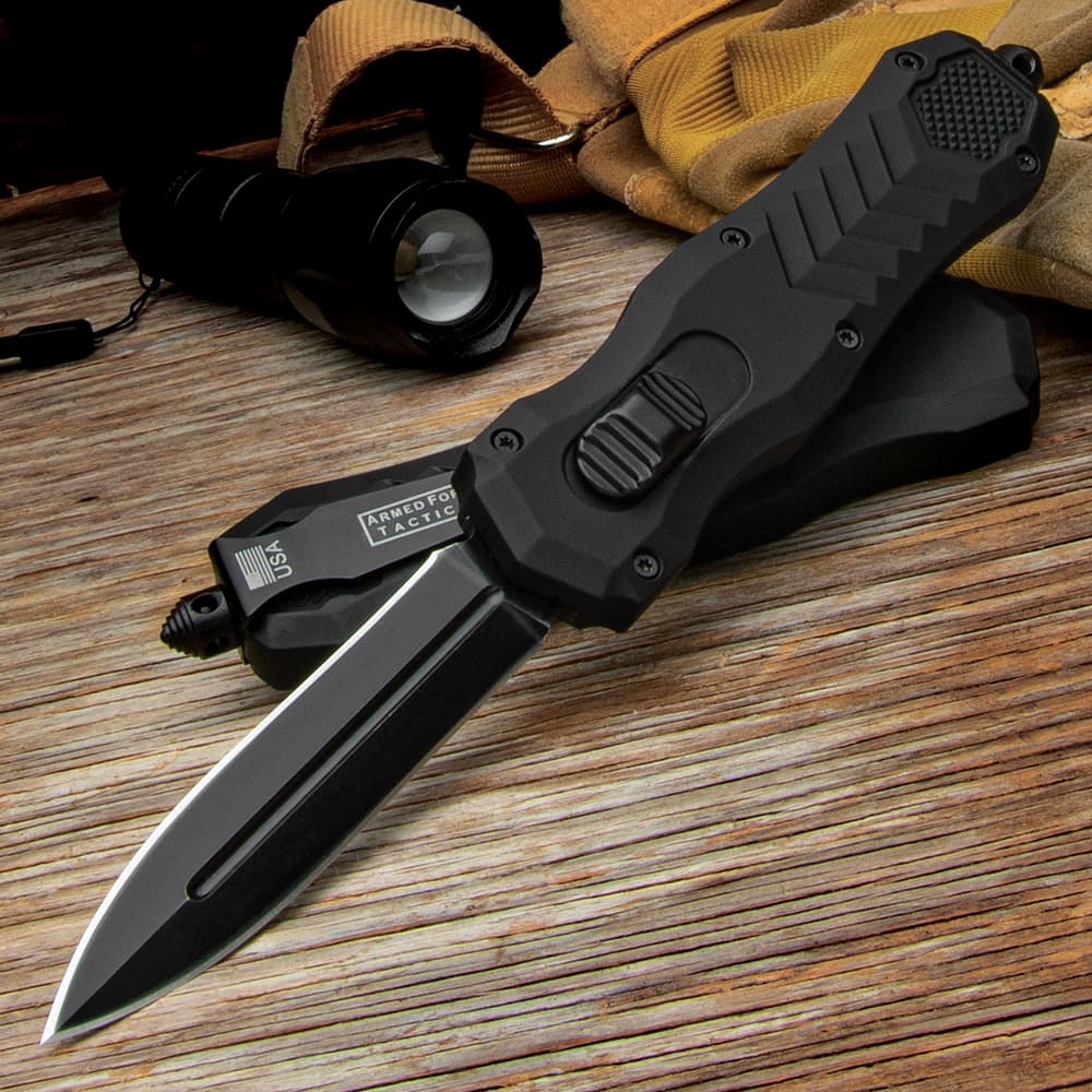 The Armed Force Tactical Black Automatic OTF Knife shown open and closed image number 0