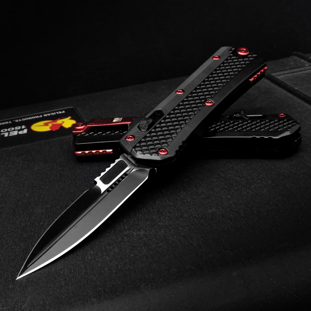 Full image of Black And Red Dagger OTF Knife shown open and closed. image number 0