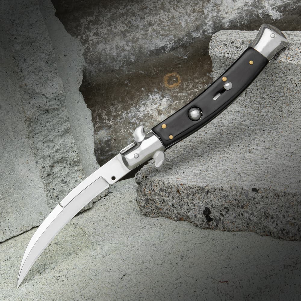 The Black Curl Automatic Stiletto Knife shown open with uniquely curved stainless steel blade and black handle. image number 0