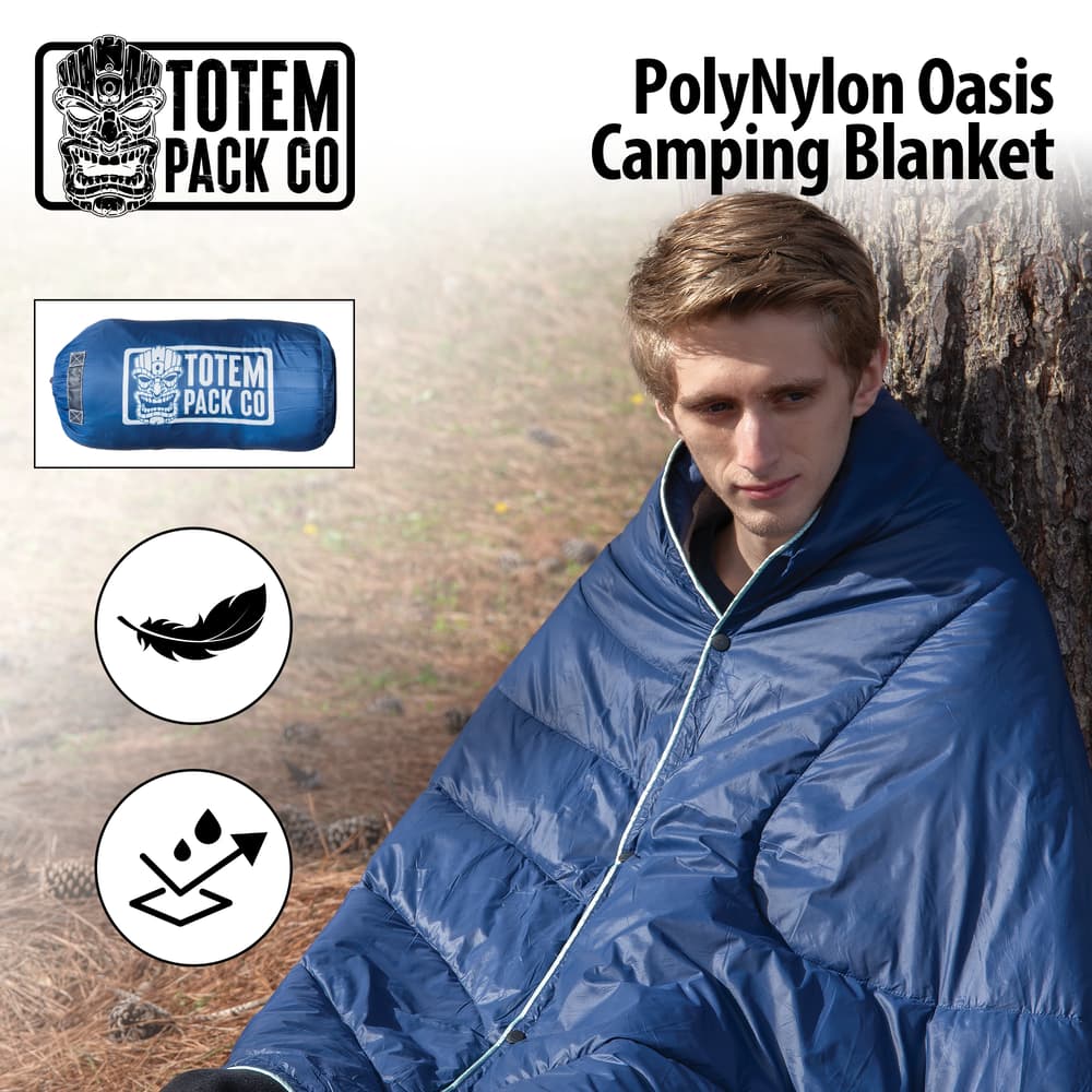 Full image of the Totem Pack Co. PolyNylon Oasis Camping Blanket being worn. image number 0