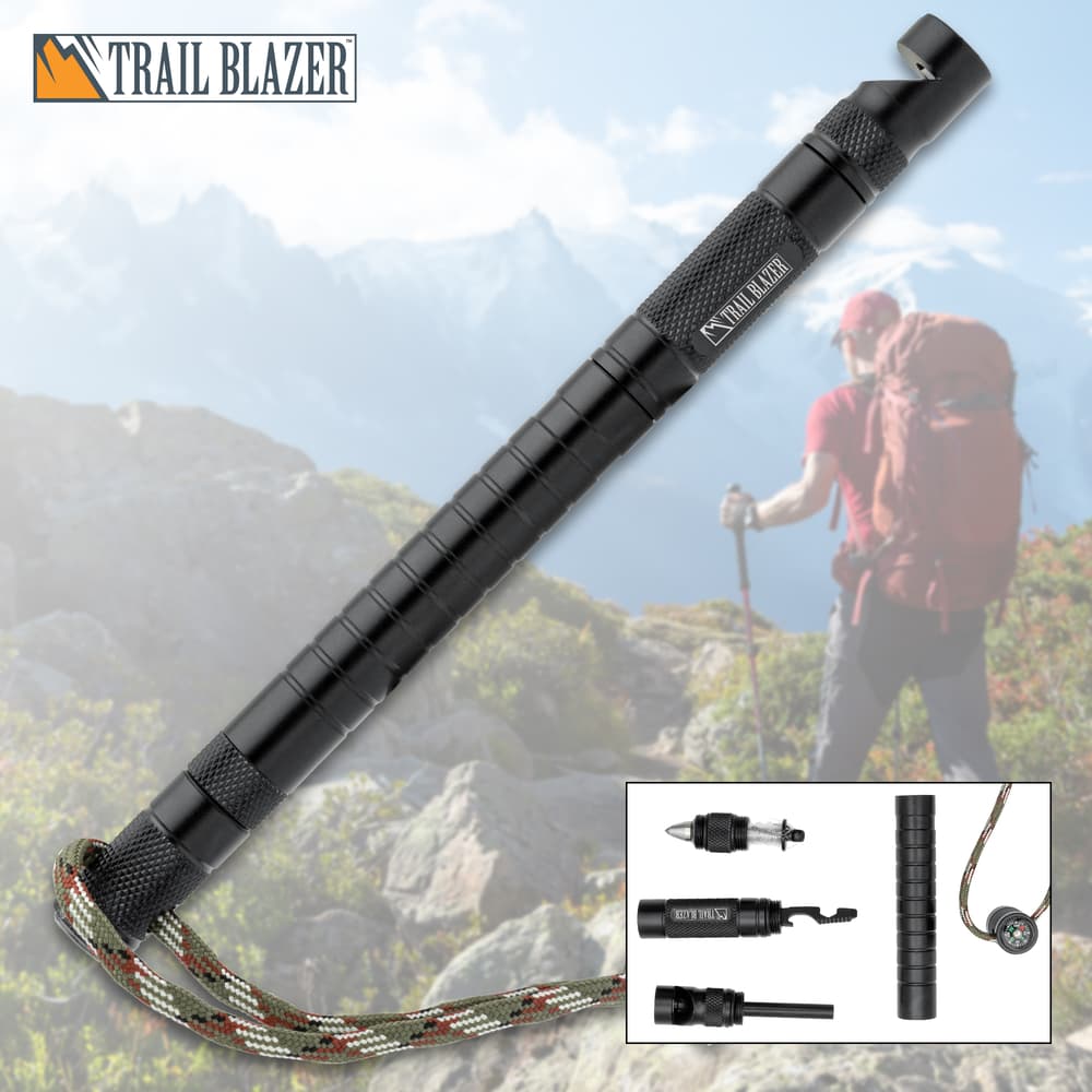 The Trailblazer 9-in-1 Survival Stick is shown with a person hiking in the background. image number 0