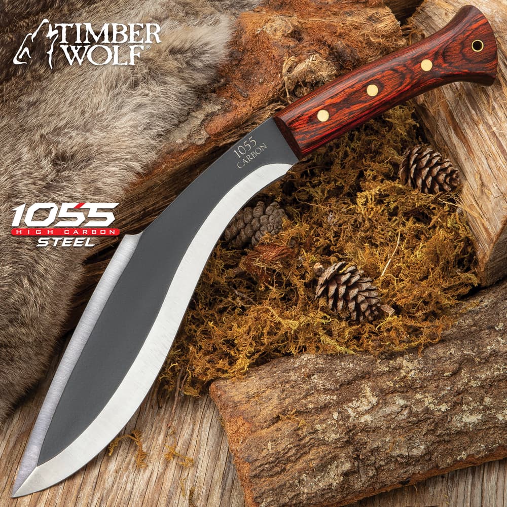 Timber Wolf Heart of Darkness Kukri Knife with 1055 carbon steel blade and dark wooden handle shown on wooden and fur background. image number 0