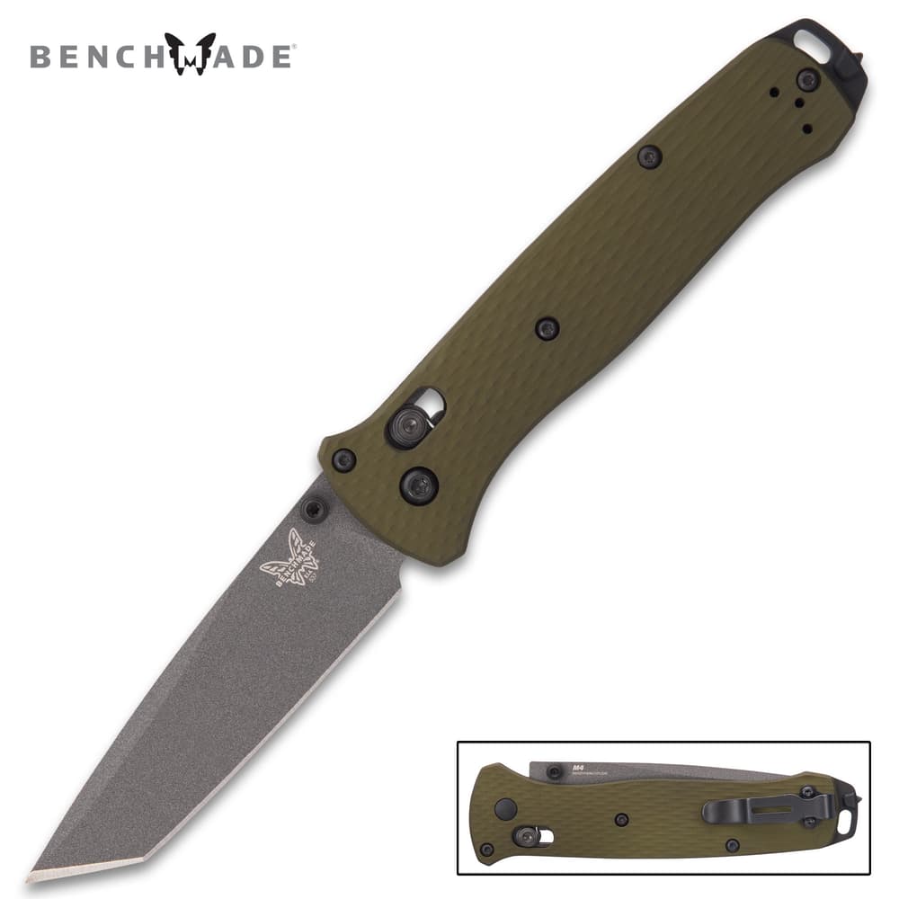 The knife has a grey-coated, 3 3/10” CPM-M4 steel tanto blade with a 62-64 HRC and thumbstuds for ease of access image number 0