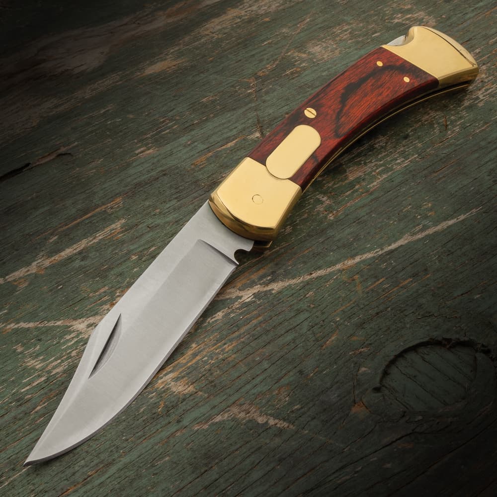 Full image of the Executive Office Automatic Brown Pocket Knife. image number 0