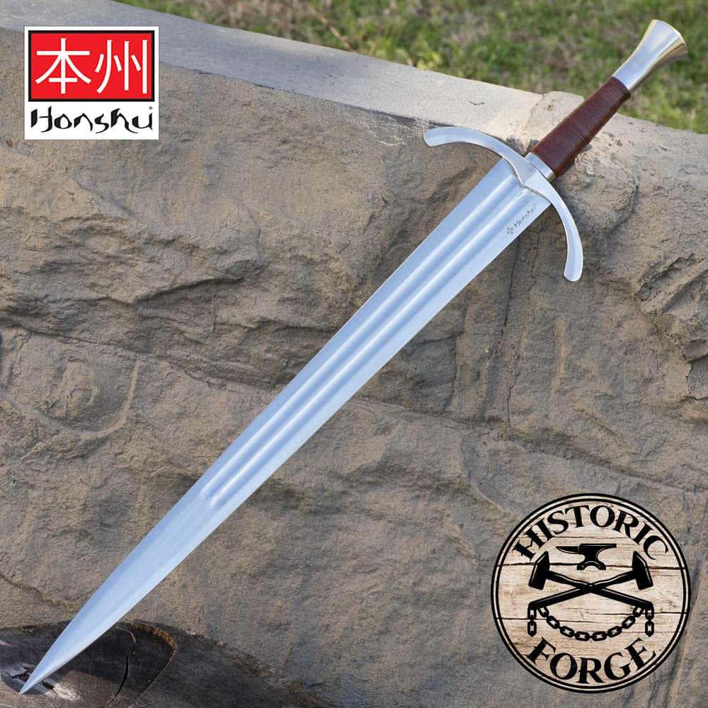 Honshu 1065 high carbon steel sword with wooden handle wrapped in brown leather attached to polished handguard image number 0