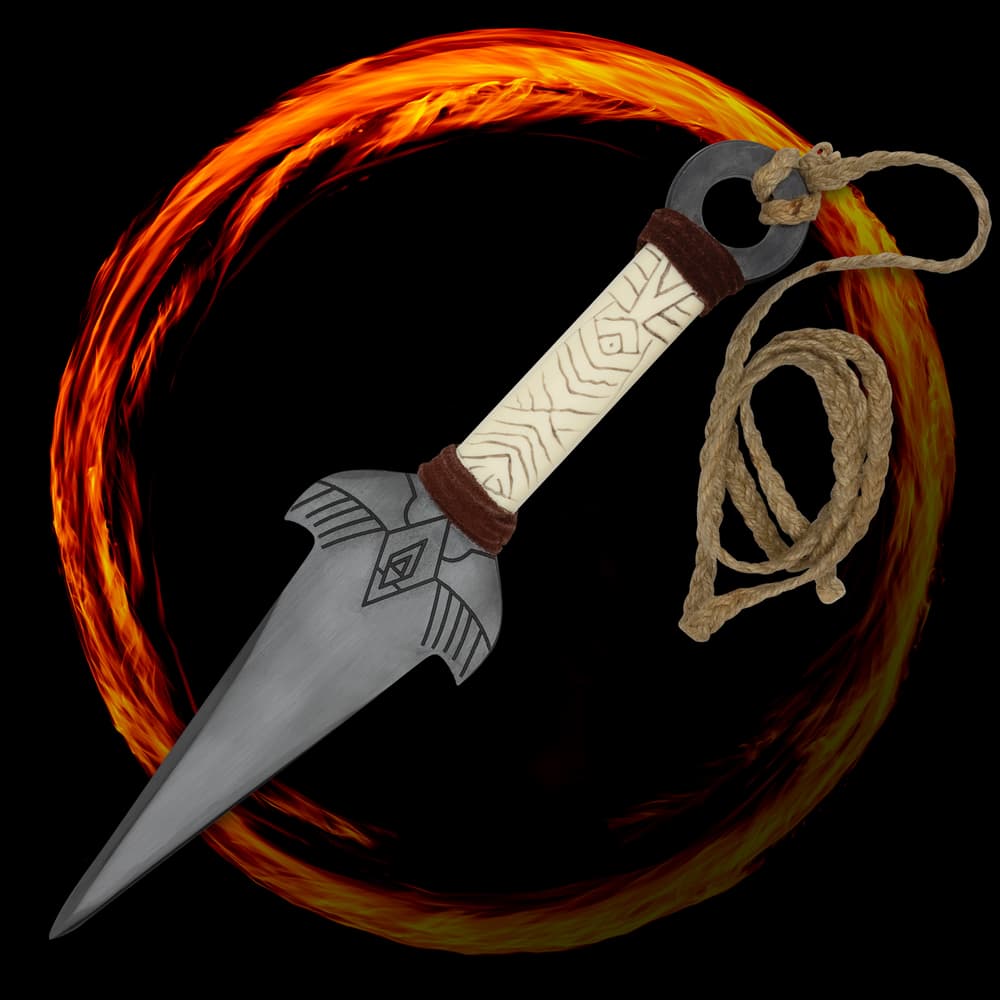 The Kombat Kunai Thrower is shown with pewter colored blade with fantasy design and faux ivory handle on a black background with red flame circle. image number 0