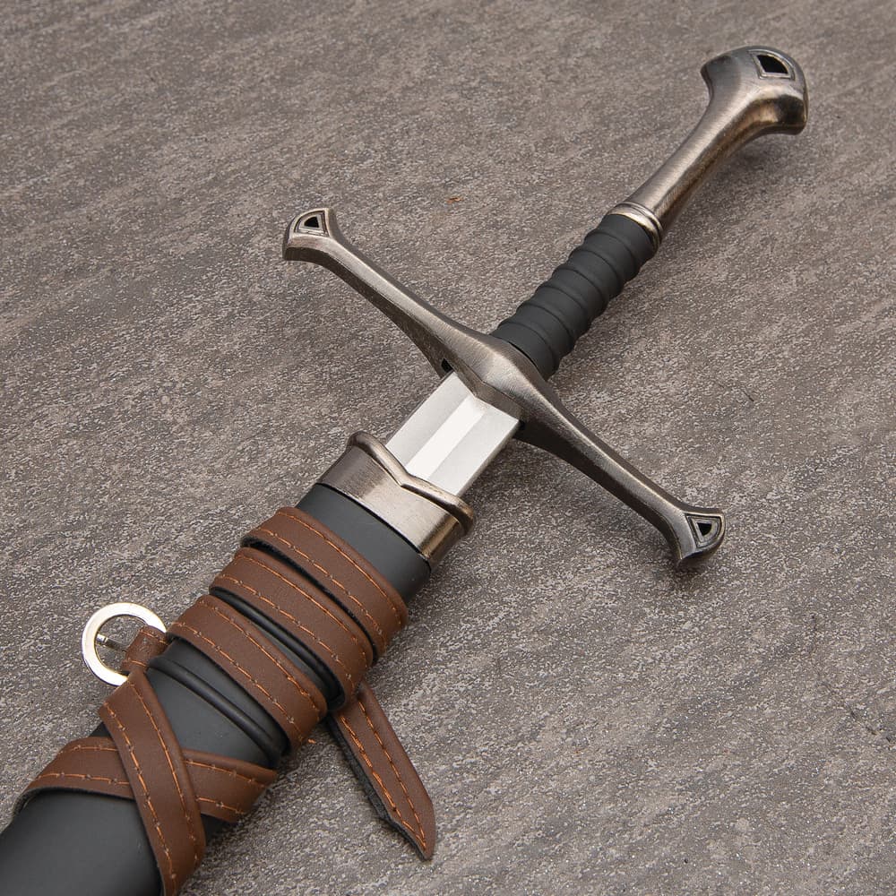 Each of the swords has a 17” stainless steel blade and a cast metal handle with an ornate guard and pommel image number 1