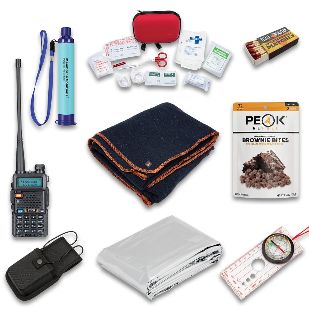 The Survivalist Bundle include waterproof matches, blanket, first aid kit, radio, water filter straw, brownie bites, radio pouch, blanket and compass. image number 1