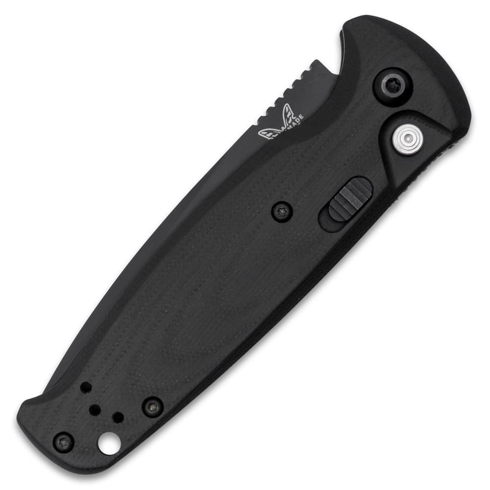 The automatic has ultra-smooth, black G10 handle scales. image number 1