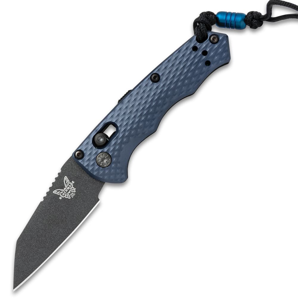 The Benchmade Immunity Automatic Knife has a charcoal grey, anodized 6061-T6 billet aluminum handle with lock mechanism on the side. image number 1