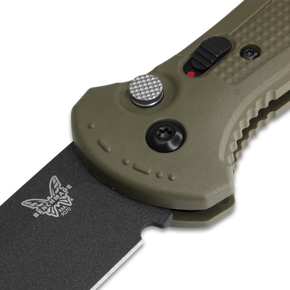 Close up image of the Claymore Auto Ranger Folder Knife blade with Benchmade logo and part of the handle. image number 1