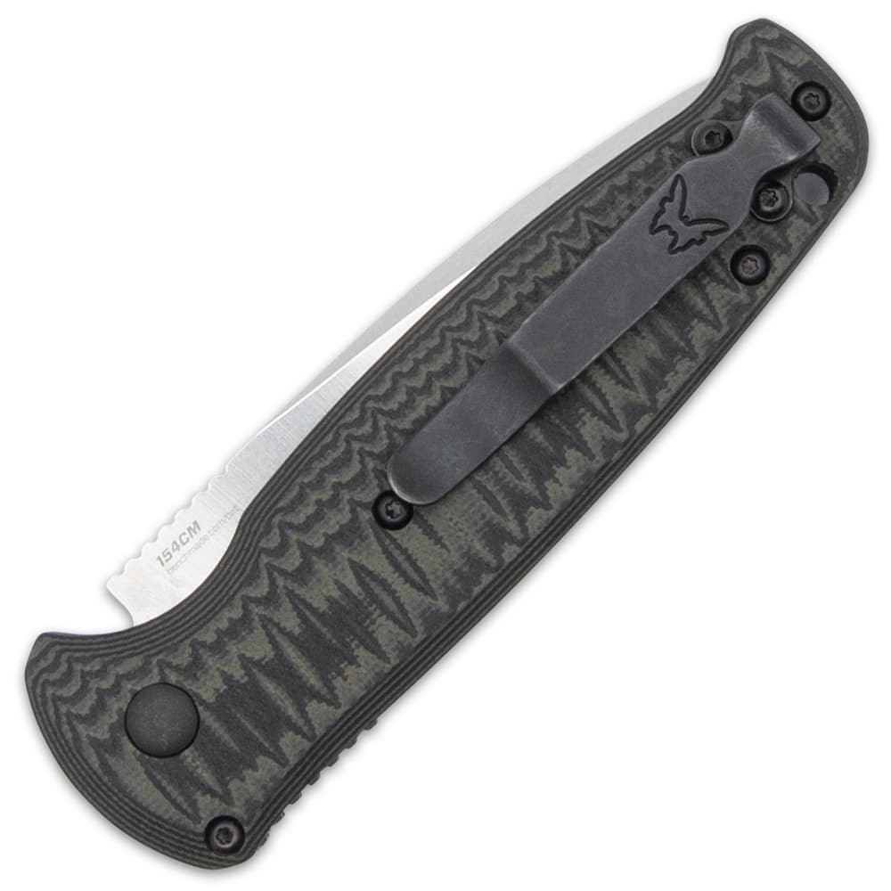 The lightweight handle has G10 handle scales and features an enlarged actuation button and a lanyard hole image number 1