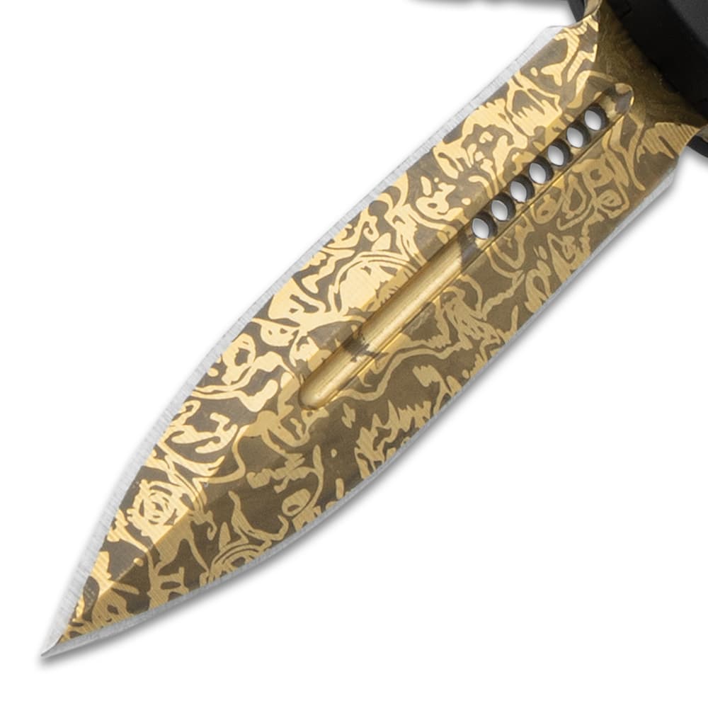Close up image of Gold Coated OTF Knife blade. image number 1
