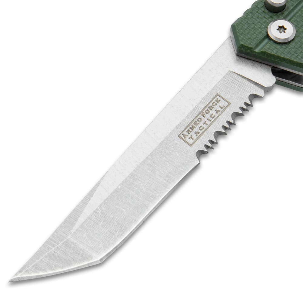 Close up image of the partial serrated blade on the Automatic Push Button Pocket Knife. image number 1