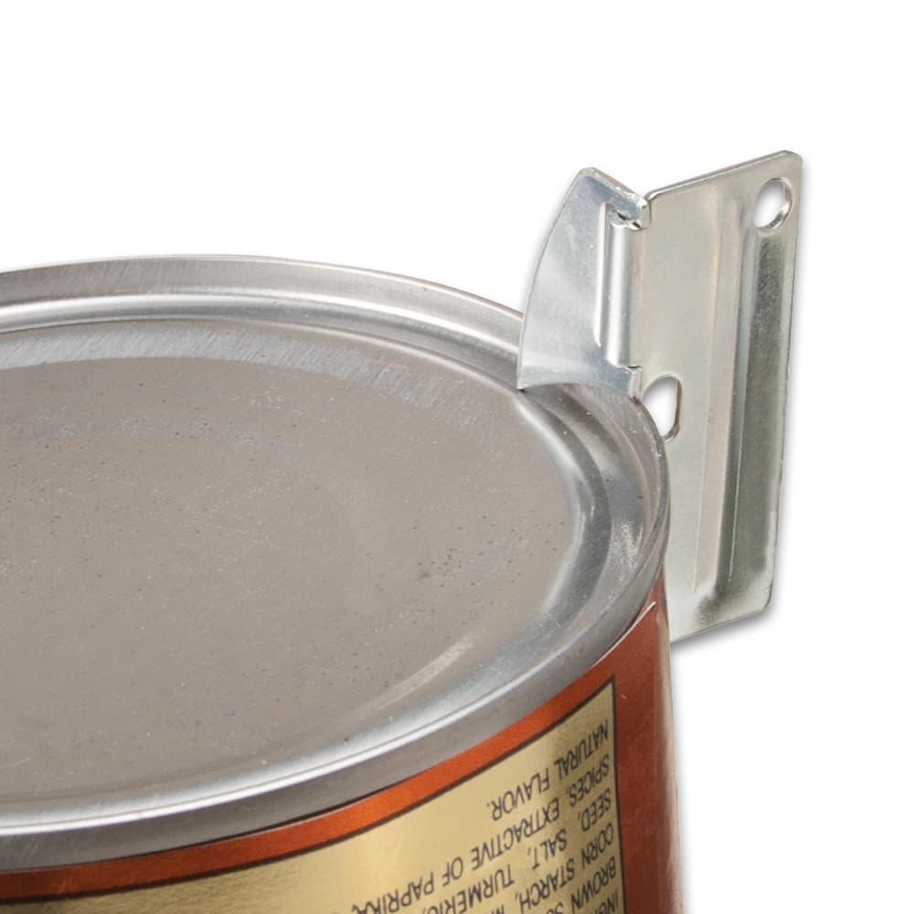 The P-51 canopener shown in use on a can image number 1