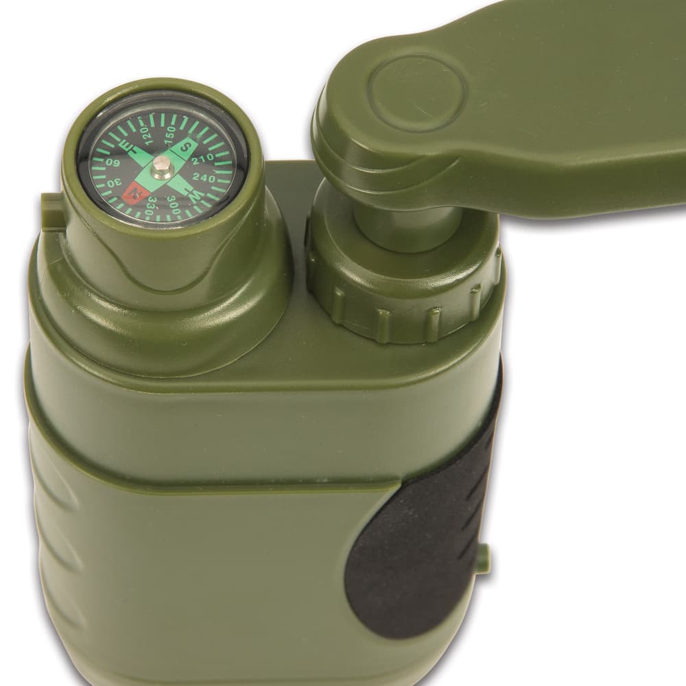 The 220ml-capacity container and pump are made of tough, food-grade plastic with a rubber grip and rubber, no-slip bottom and an integrated compass image number 1