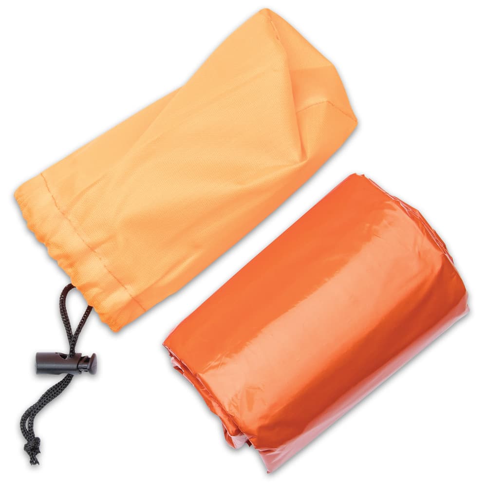 The reusable, emergency sleeping bag’s overall dimensions are 7’x3’ and packs neatly into a nylon carry pouch image number 1