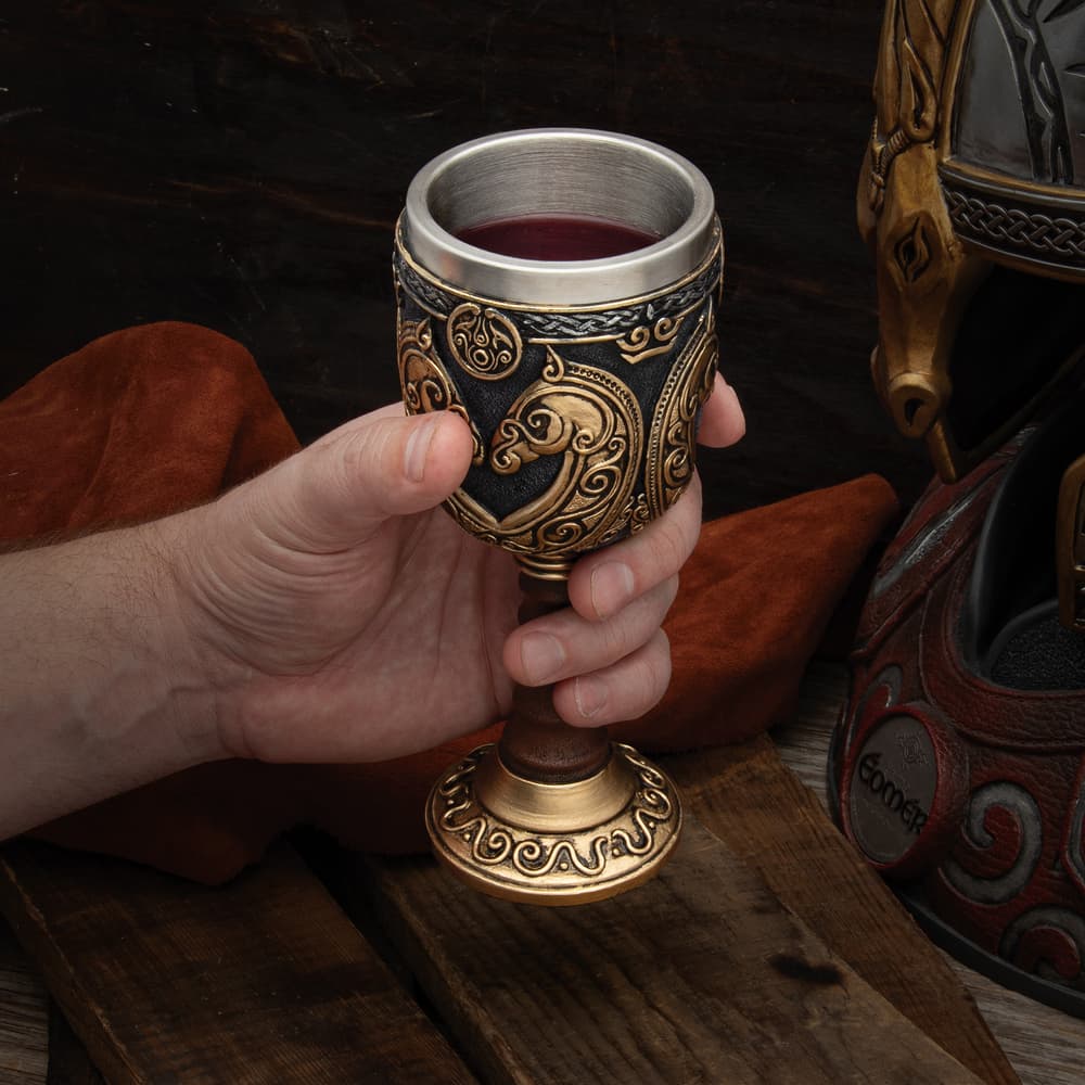 Full image of the Horse Lord Goblet held in hand. image number 1