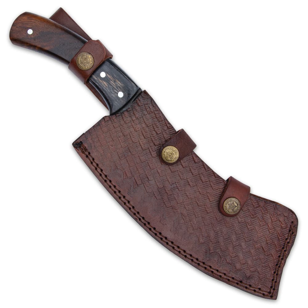 The 12” overall cleaver knife can be carried and stored in a premium leather belt sheath with a basket-weave texture image number 1