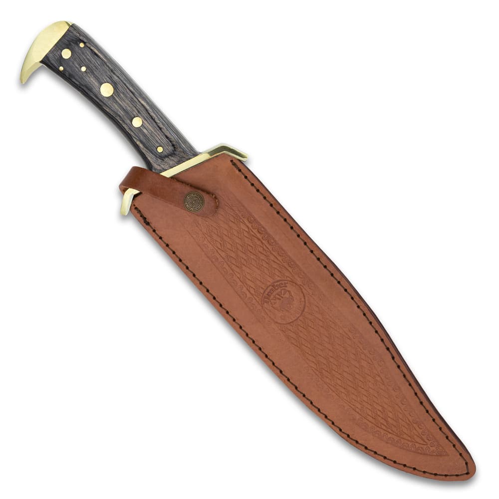 The bowie knife is housed in a handmade genuine leather belt sheath. image number 1
