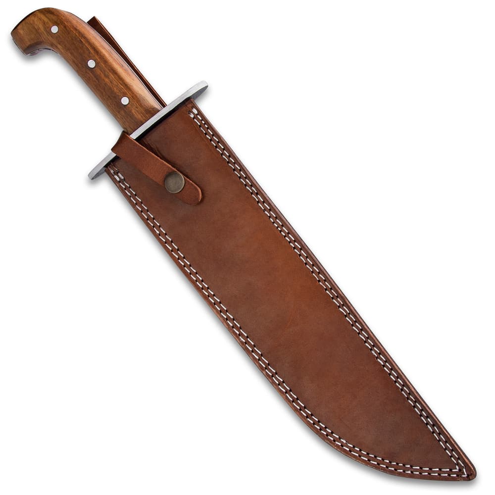 The 17” overall survivor knife can be carried and stored in its premium leather belt sheath with a handle snap strap image number 1