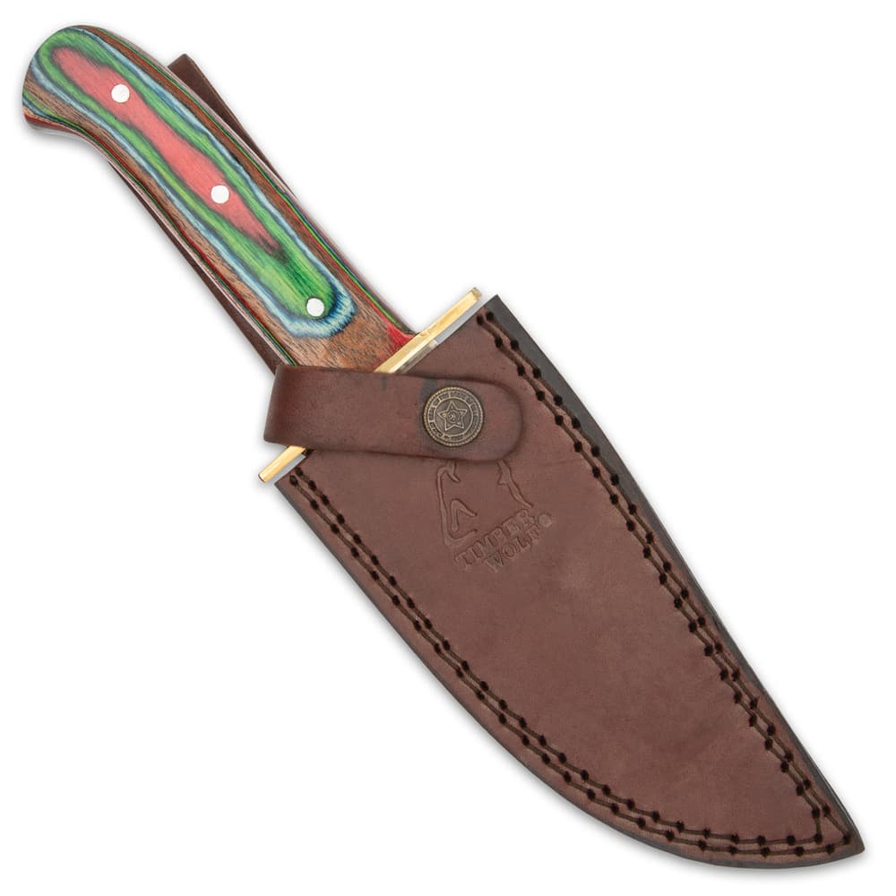 The 10 3/4” knife can be stored and carried in its genuine, premium leather belt sheath, which has a snap strap closure image number 1