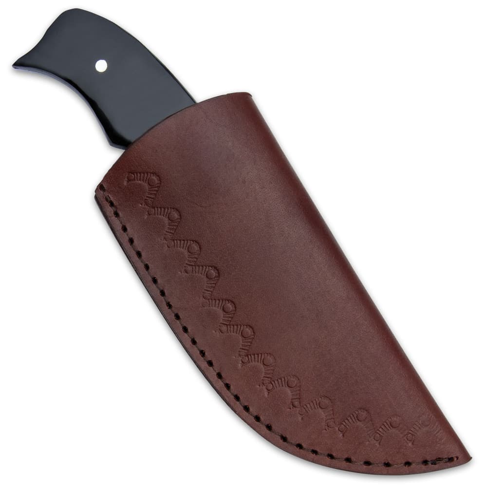 The 7 1/2” overall fixed blade knife can be carried and stored in a premium leather belt sheath image number 1