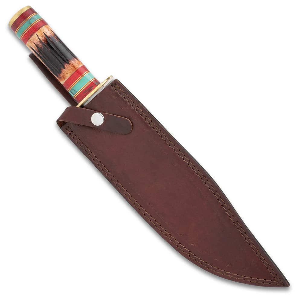 The fixed blade knife in its sheath image number 1