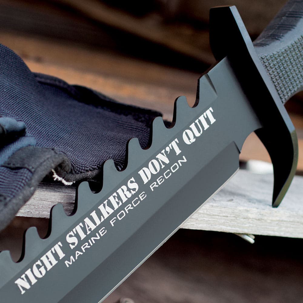 United Cutlery Marine Force Recon Night Stalker Bowie Knife has “Night Stalkers Don’t Quit” down the side of the black blade. image number 1