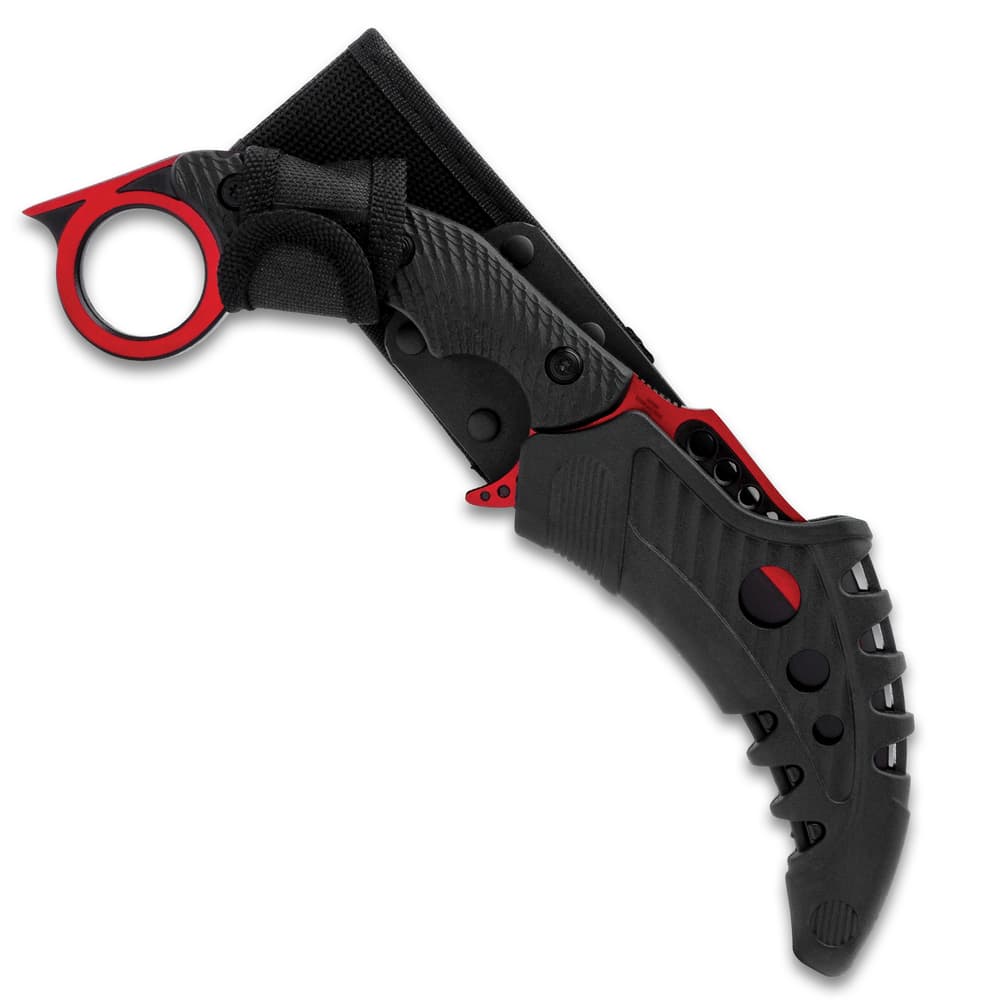 The M48 karambit can be easily carried in its Vortec belt sheath image number 1