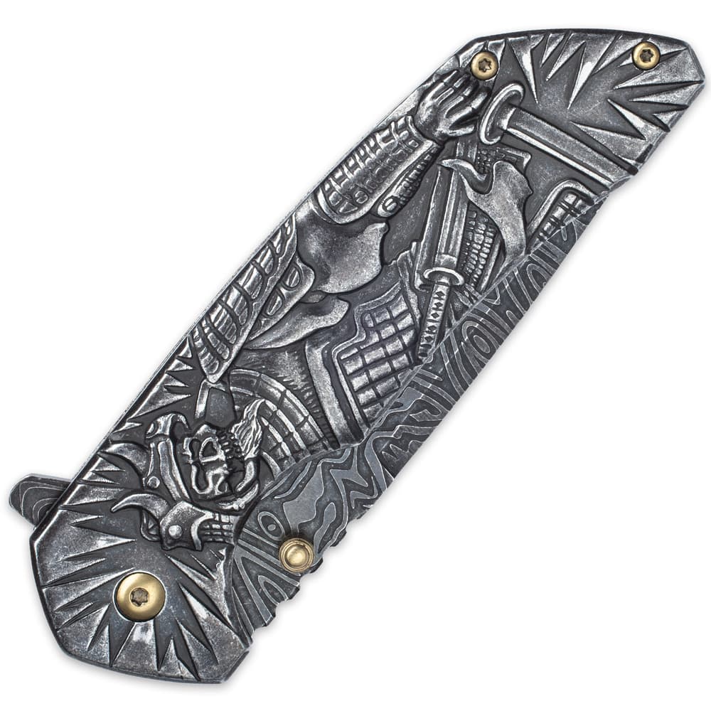The knife’s handle has sculpted artwork of a Shogun warrior posed with a sword. image number 1