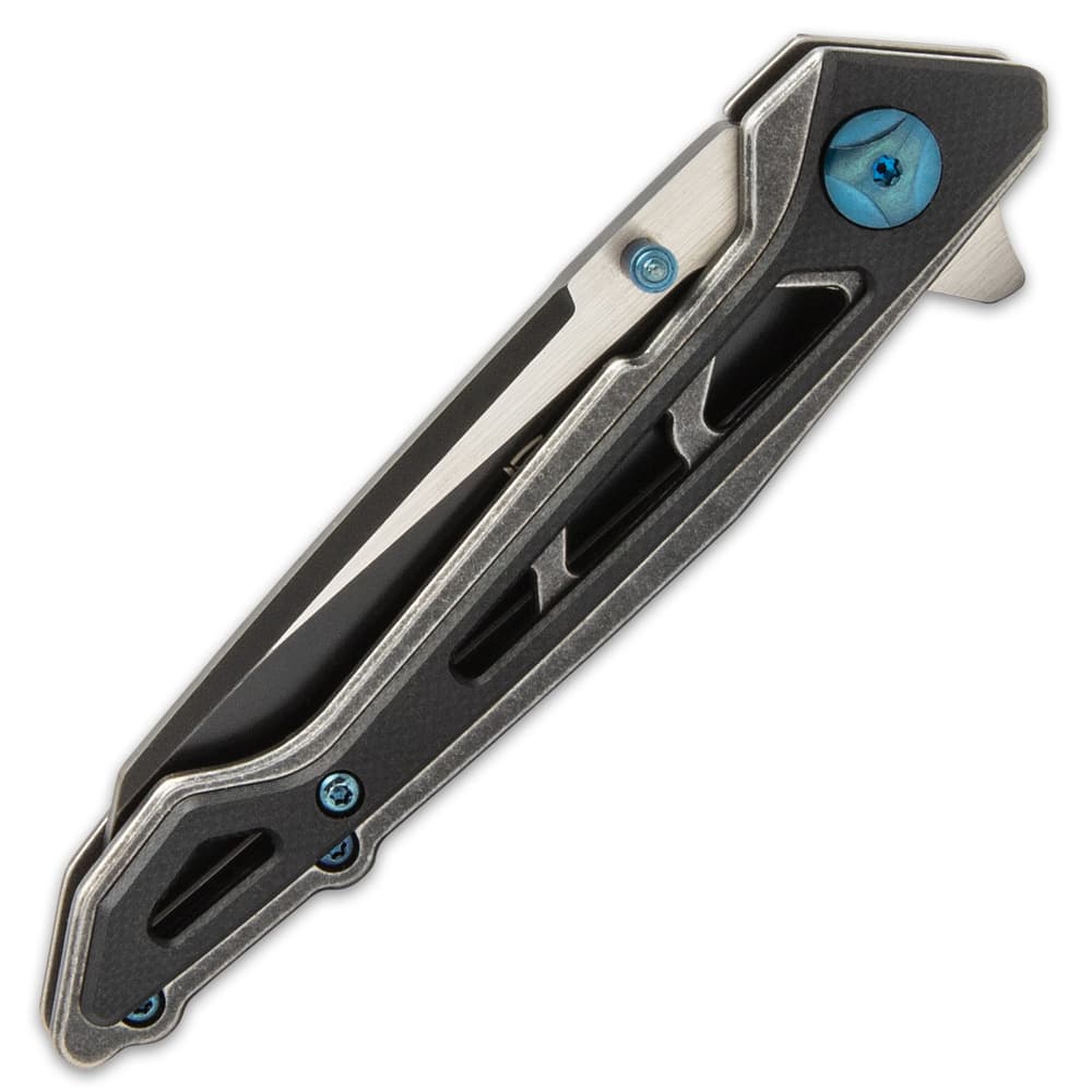 The lightweight, skeleton handle is of stainless steel with black, G10 scales and it has a metallic blue pocket clip image number 1