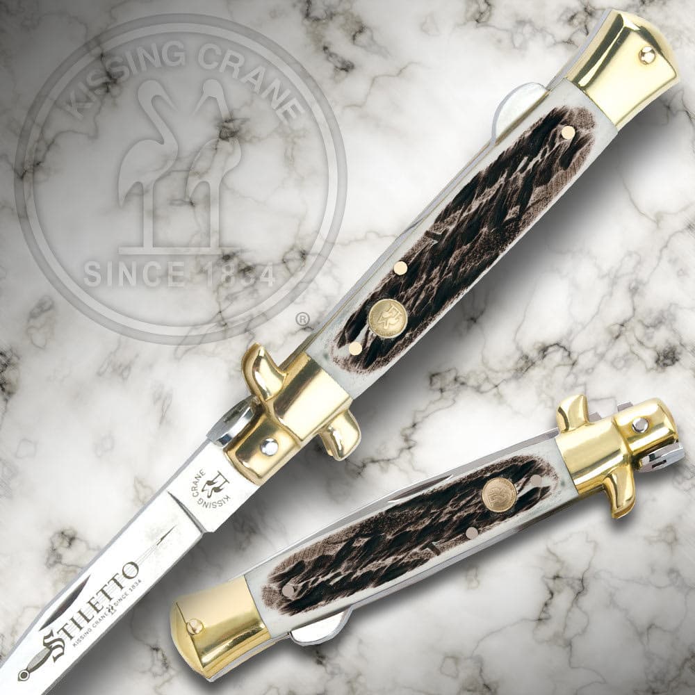 The 8 3/4” knife is 4 3/4” closed and has a stainless steel blade, burnt bone handle, and brass-plated nickel silver pins and bolsters. image number 1