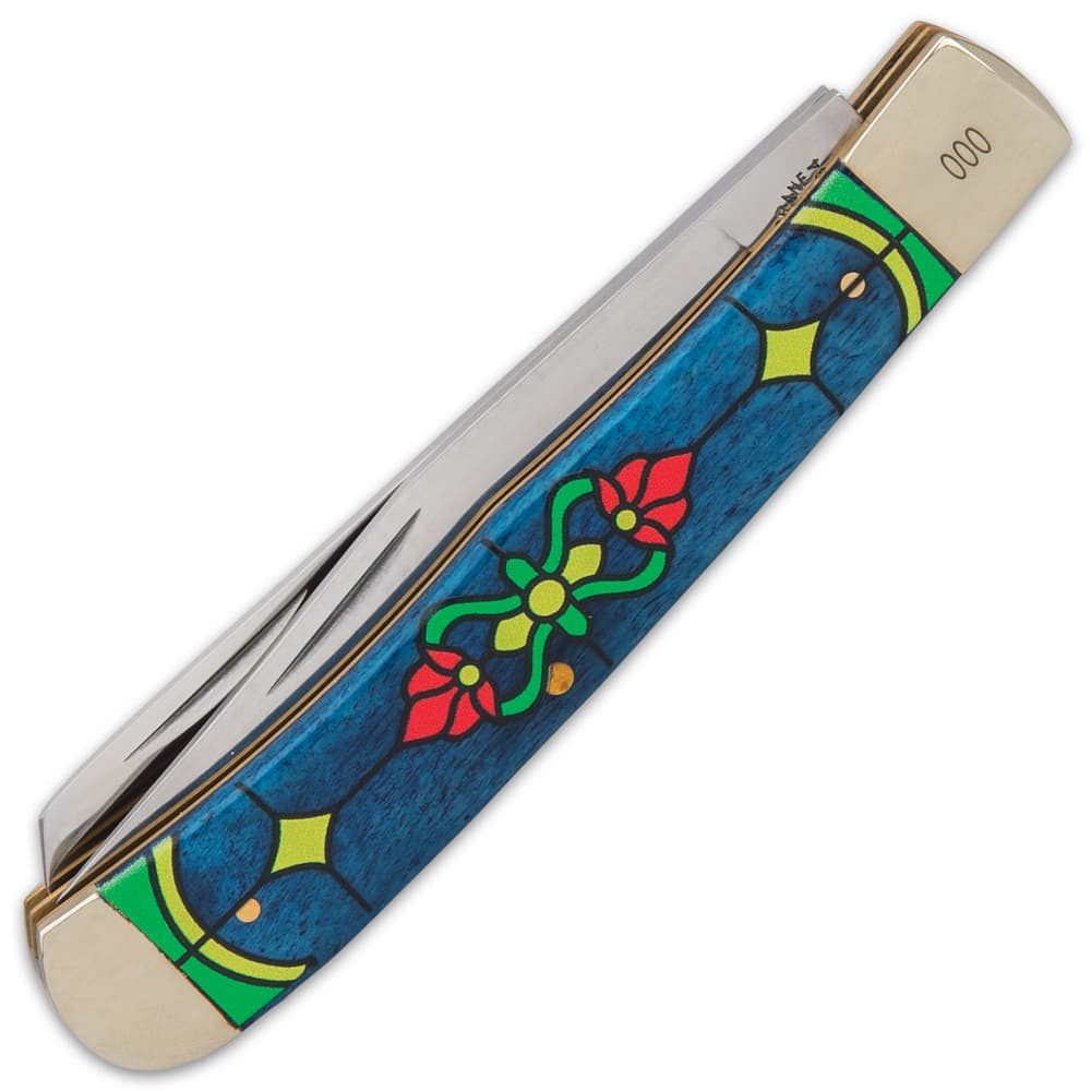 The handle scales are blue bone with 3D printed, flowered stained glass artwork and also features gleaming brass liners image number 1