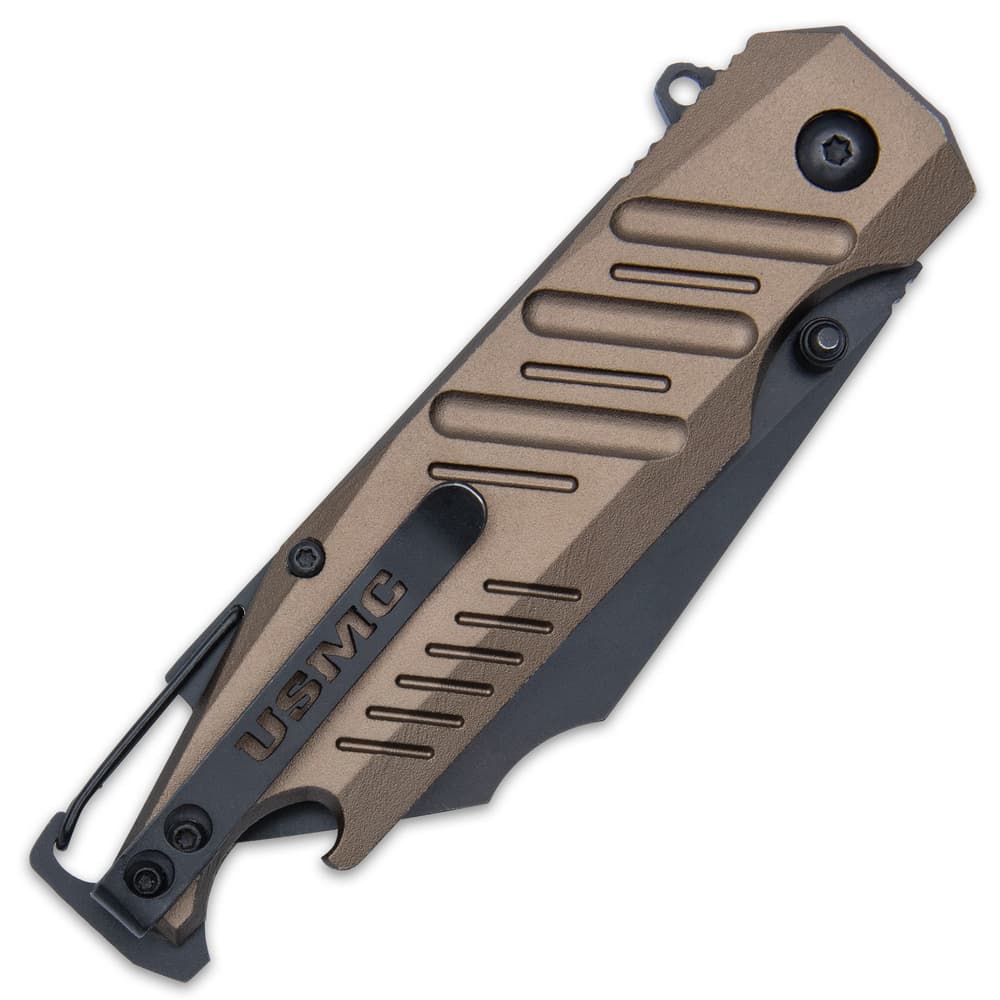 The assisted opening pocket knife also, for ease of carry, has a sturdy, black metal pocket clip with a cut-out “USMC” image number 1