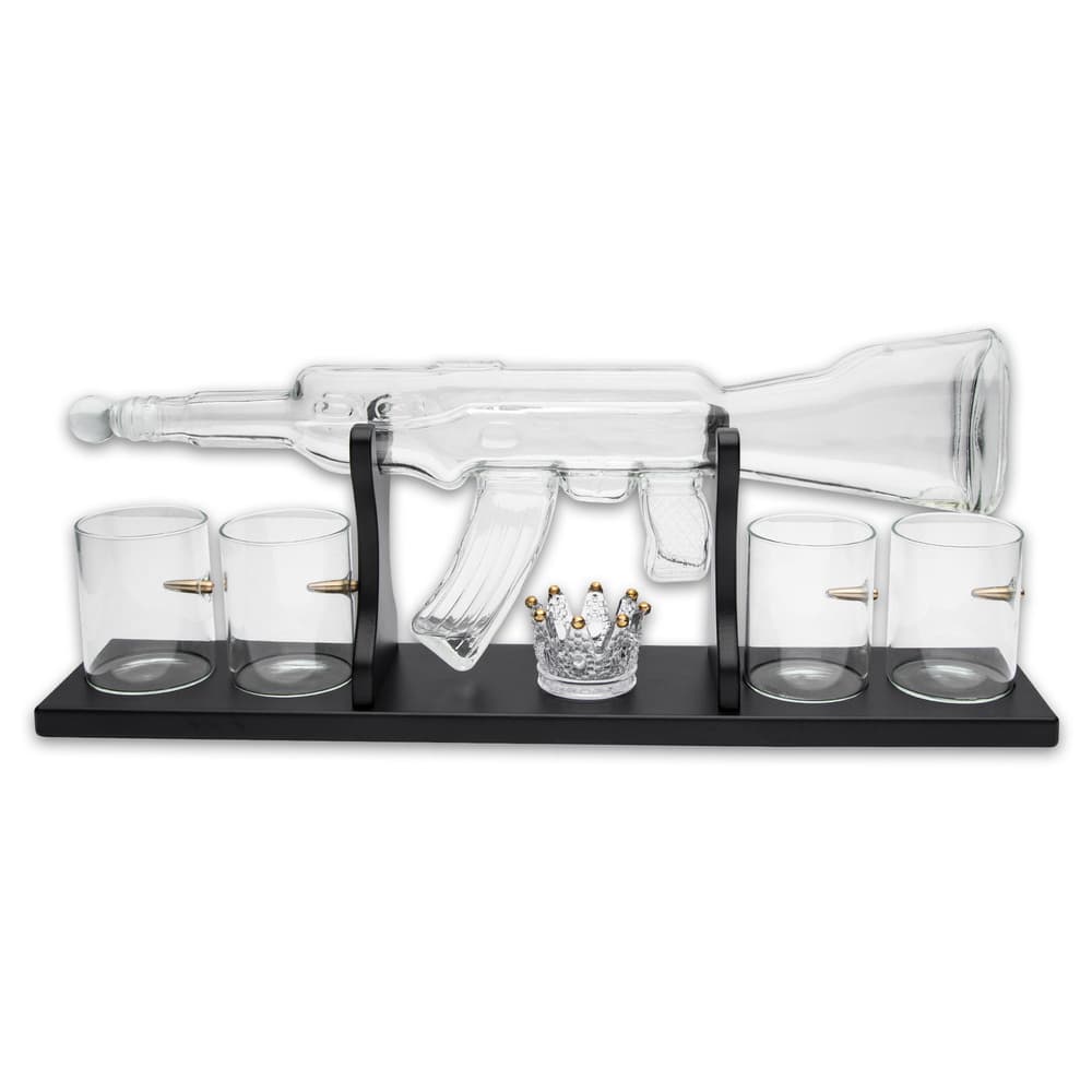 The set includes a premium glass decanter and four high-ball glasses, a set of whiskey stones and a small decorative glass image number 1