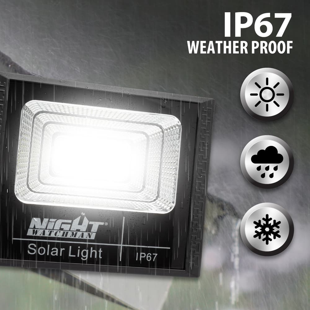 Full image of the Outdoor Solar Light 1100 Lumens out in the rain displaying that it is IP67 weather proof. image number 1