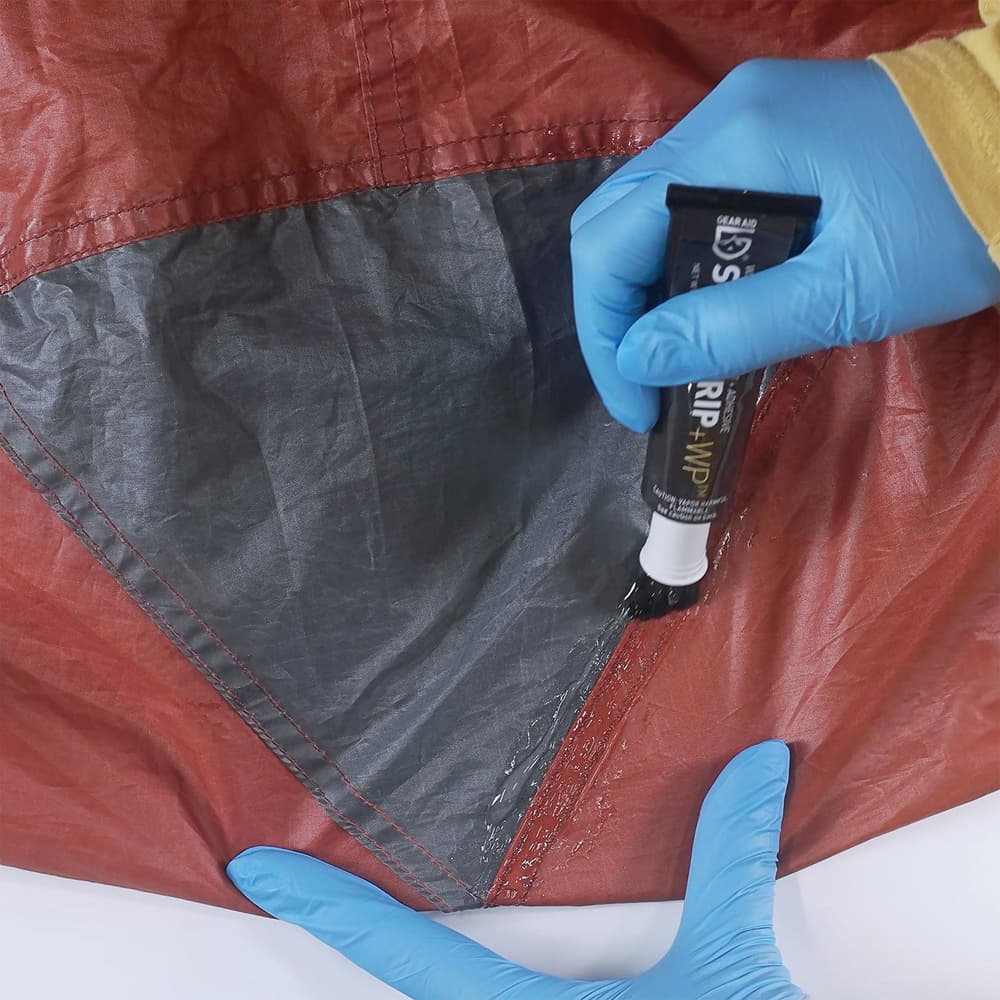 The tough, thermoset urethane formula bonds permanently to tents, awnings, campers, and even PVC plastic image number 1