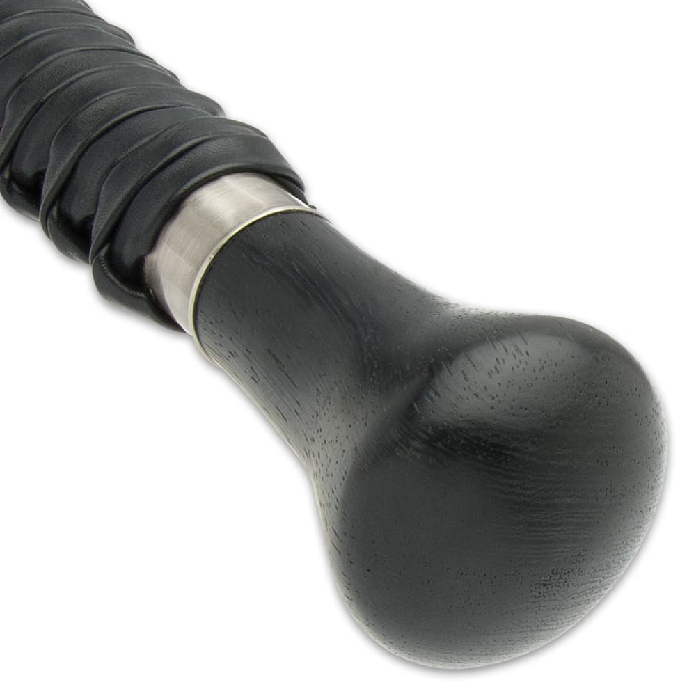 It has a black wooden knob handle image number 1