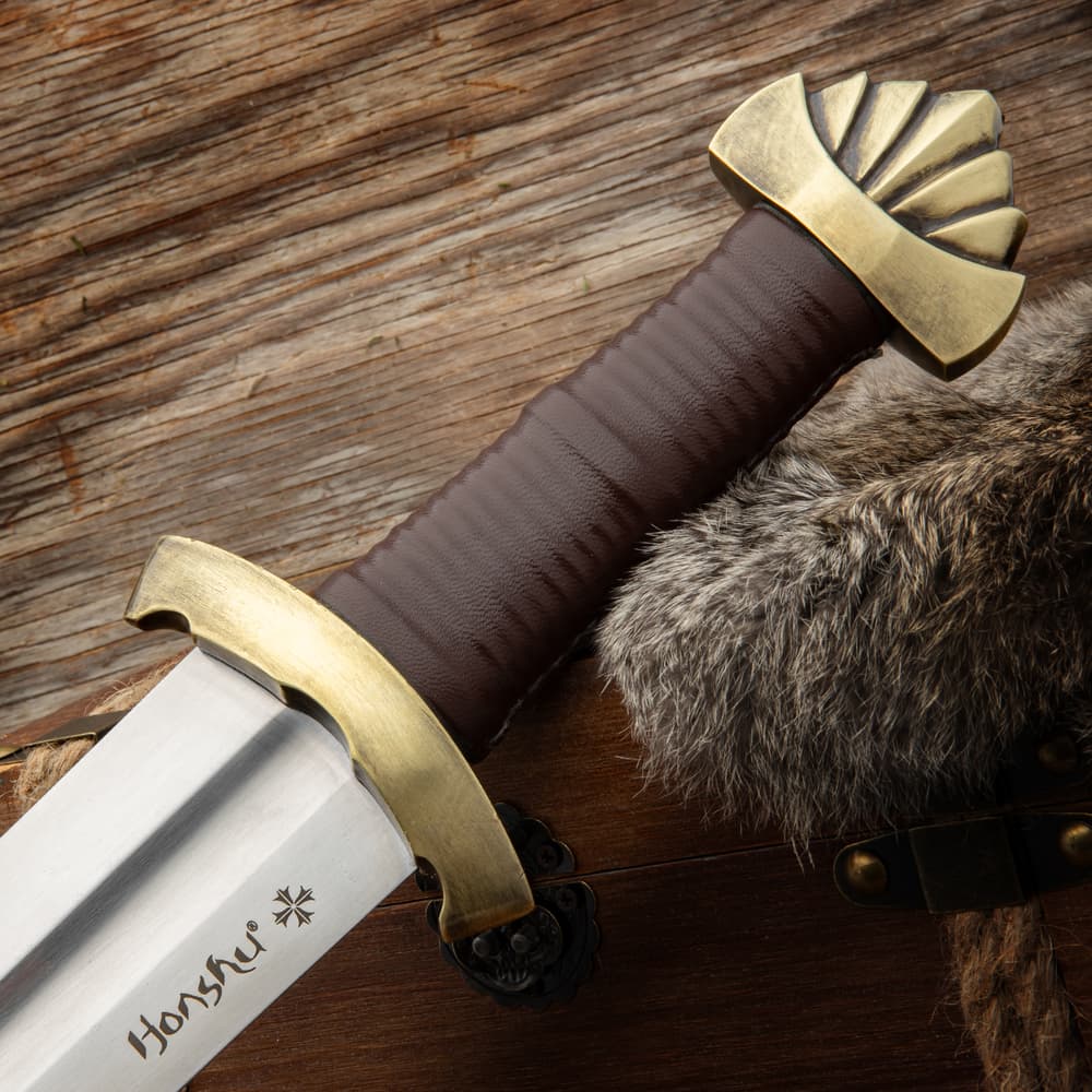 Close up image of the handle, pommel, and guard on the Historic Forge Viking Sword. image number 1