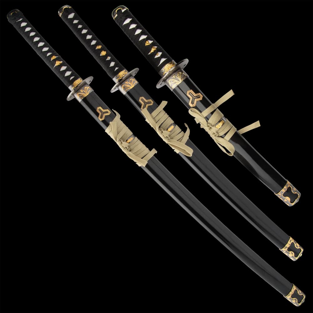 The 40 1/10” katana has a 26 7/10” blade, the 30 7/10” wakizashi has an 18 4/5” blade and the 20 2/5” tanto has a 11” blade image number 1