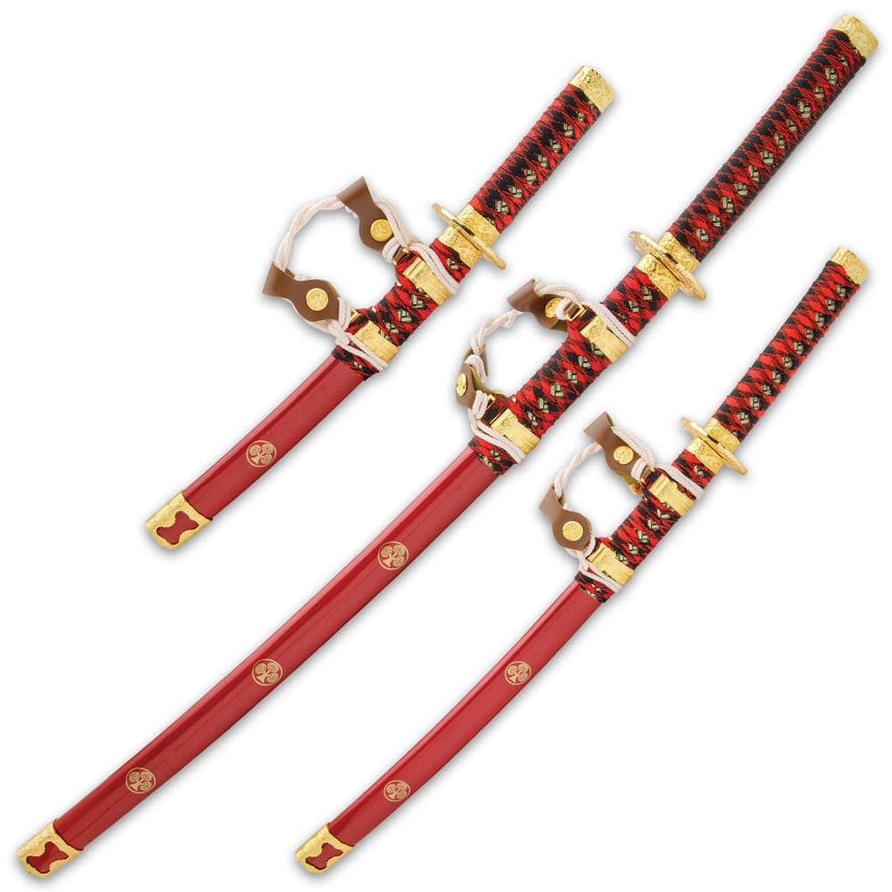 The red wooden scabbards have gold-painted artwork, and each has a white cord and faux leather sword hanger image number 1