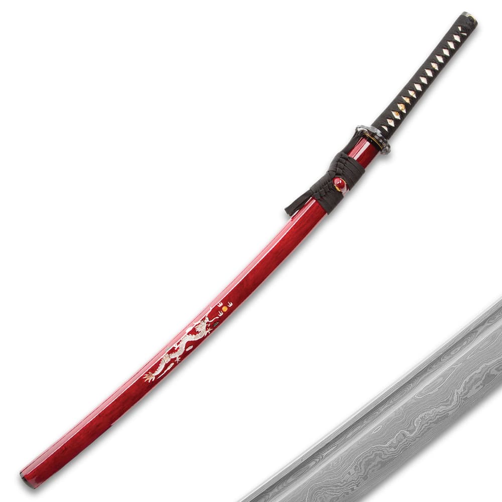 Shinwa katana sword encased in red lacquered saya with dragon emblem extended to white rayskin handle wrapped with black cord image number 1