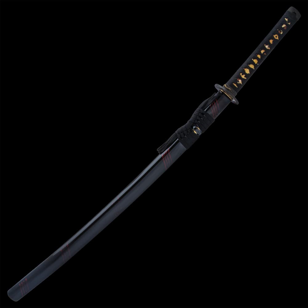 The 40” overall katana slides smoothly into a black, lacquered scabbard, accented with red slashes and black cord-wrap image number 1