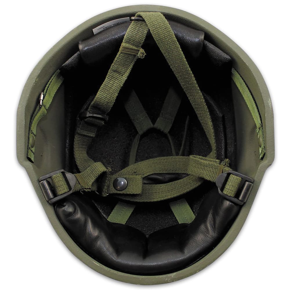 This ballistic nylon helmet is in used condition and has an adjustable liner and chin strap, plus inside padding for comfort image number 1