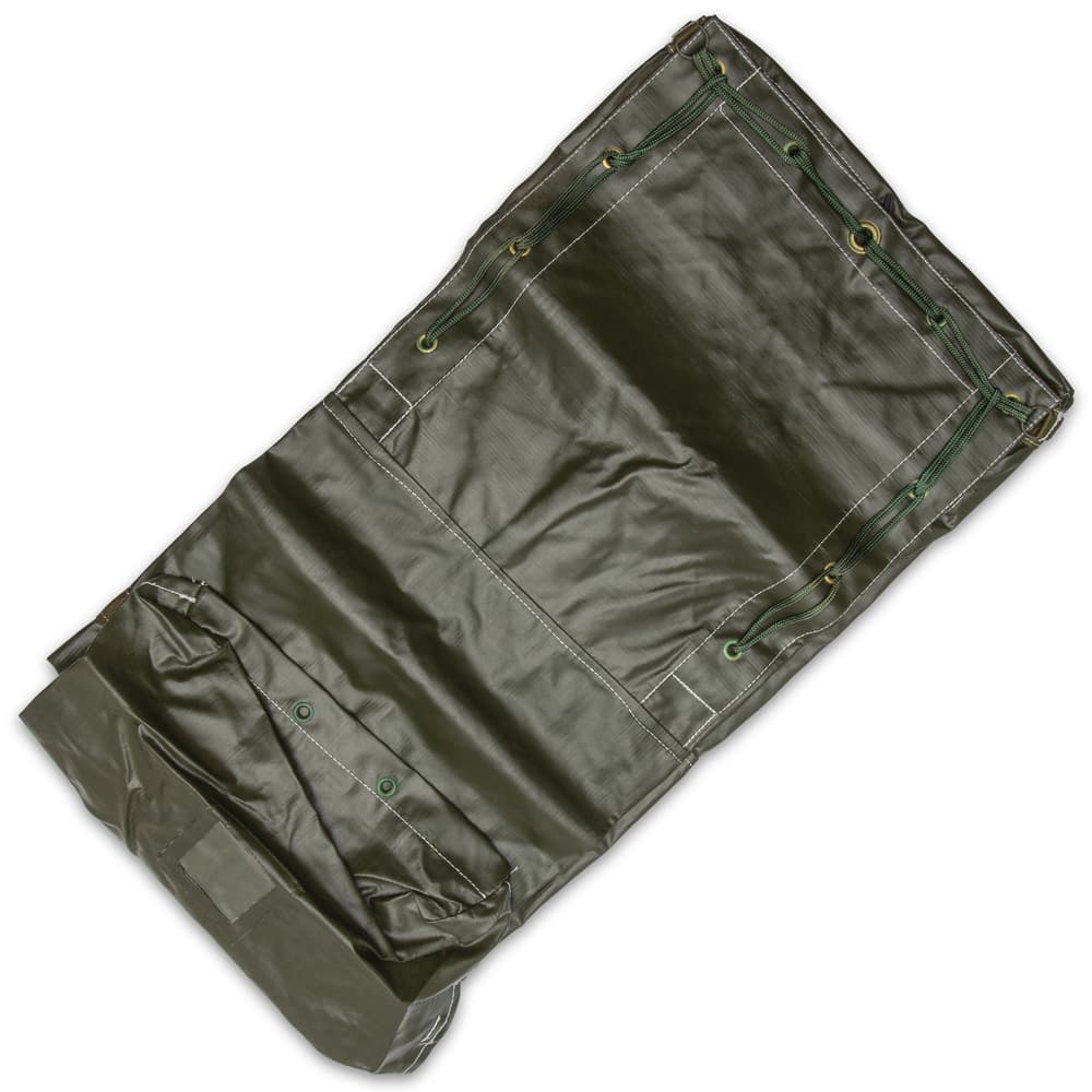 The like new duffle bag is made of water-resistant, olive drab vinyl material and has a single sturdy shoulder strap image number 1