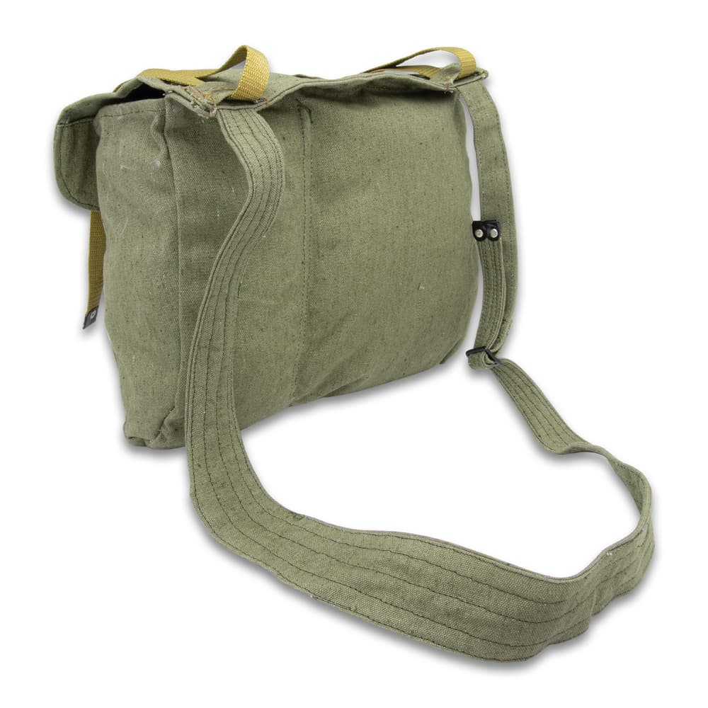 A view of the back of the combat pack with its shoulder strap image number 1